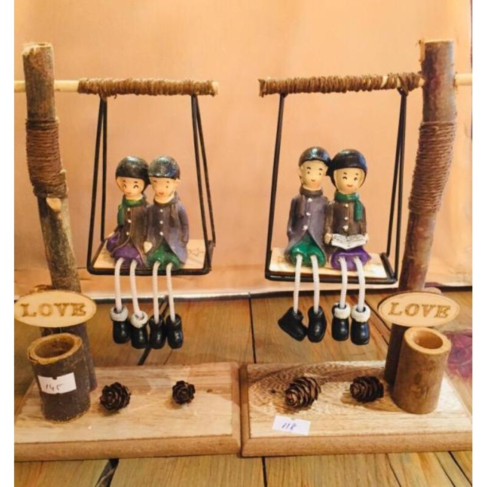 Lover's Trinket on Wooden Swing